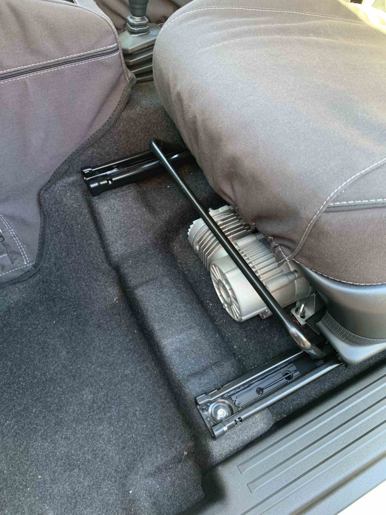Compr under seat